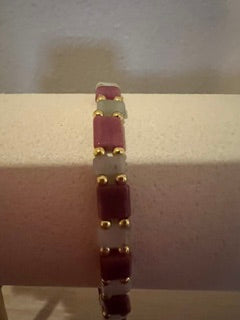 Rhodochrosite and amazonite with gold