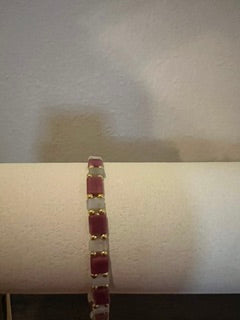 Rhodochrosite and amazonite with gold