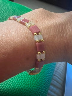 Rhodochrosite and amazonite with gold